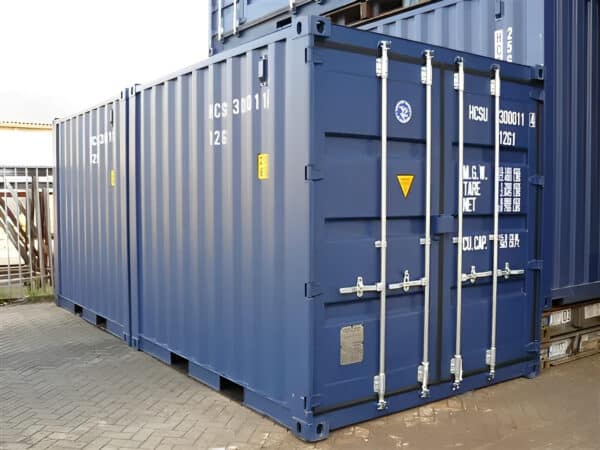 Weatherproof portable storage container with forklift pockets